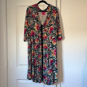 Torrid Betsey Johnson snap-front babydoll dress in a floral graffiti print.